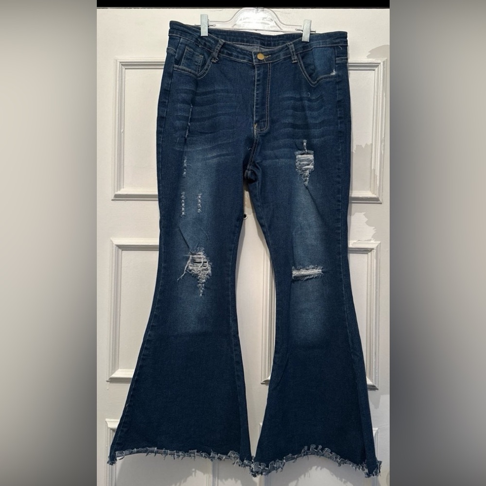 Blue Jeans with bell bottoms. Size XL. Fits like an 18P.